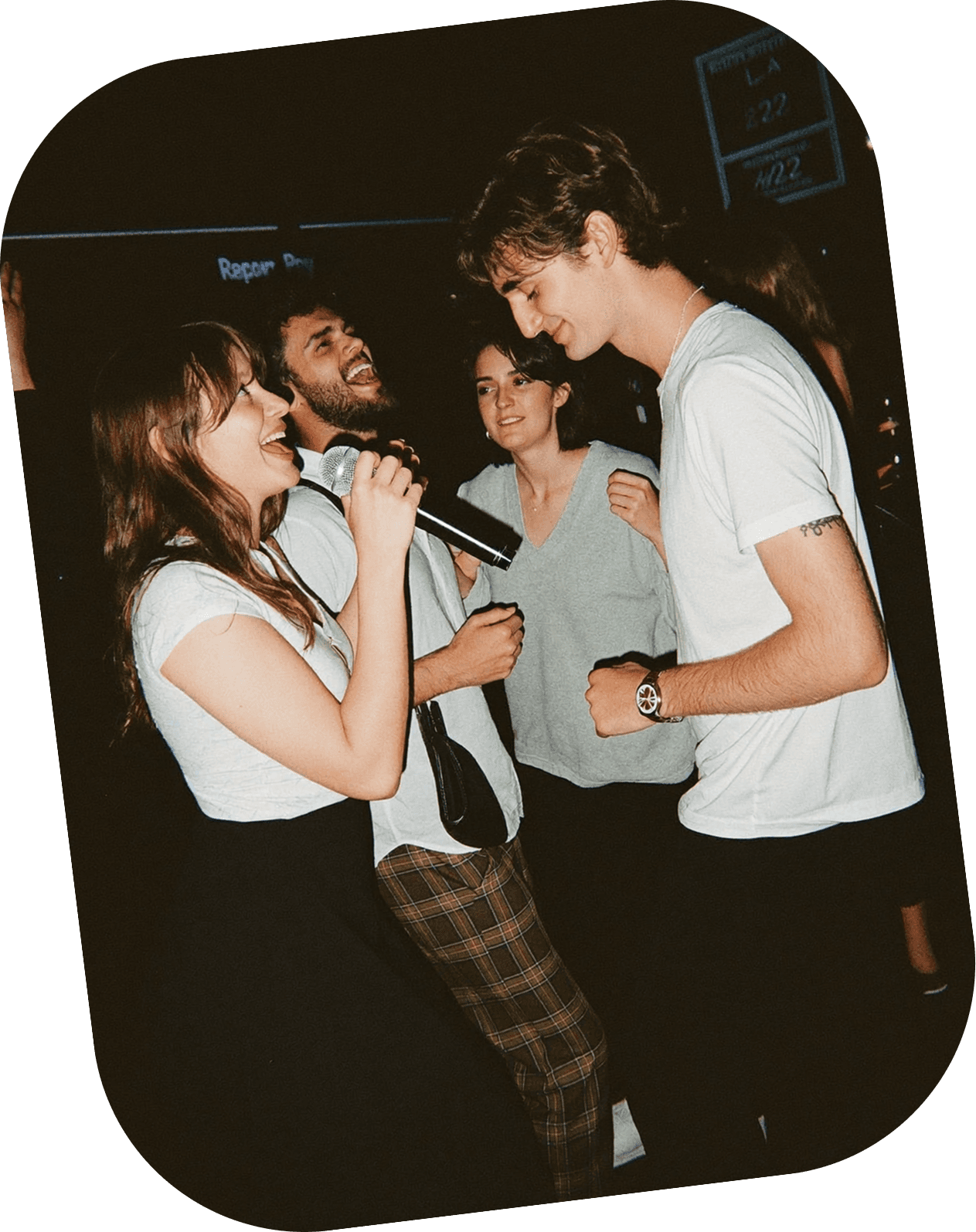 Friends singing karaoke